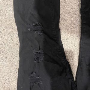 Torrid black ripped skinny jeans